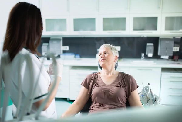 Woman in dental exam chair